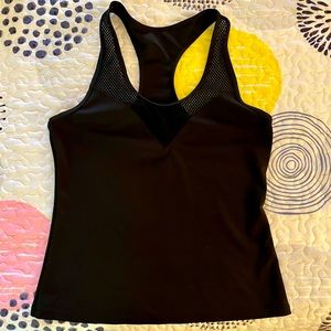 Black workout top with racer-back + mesh detail